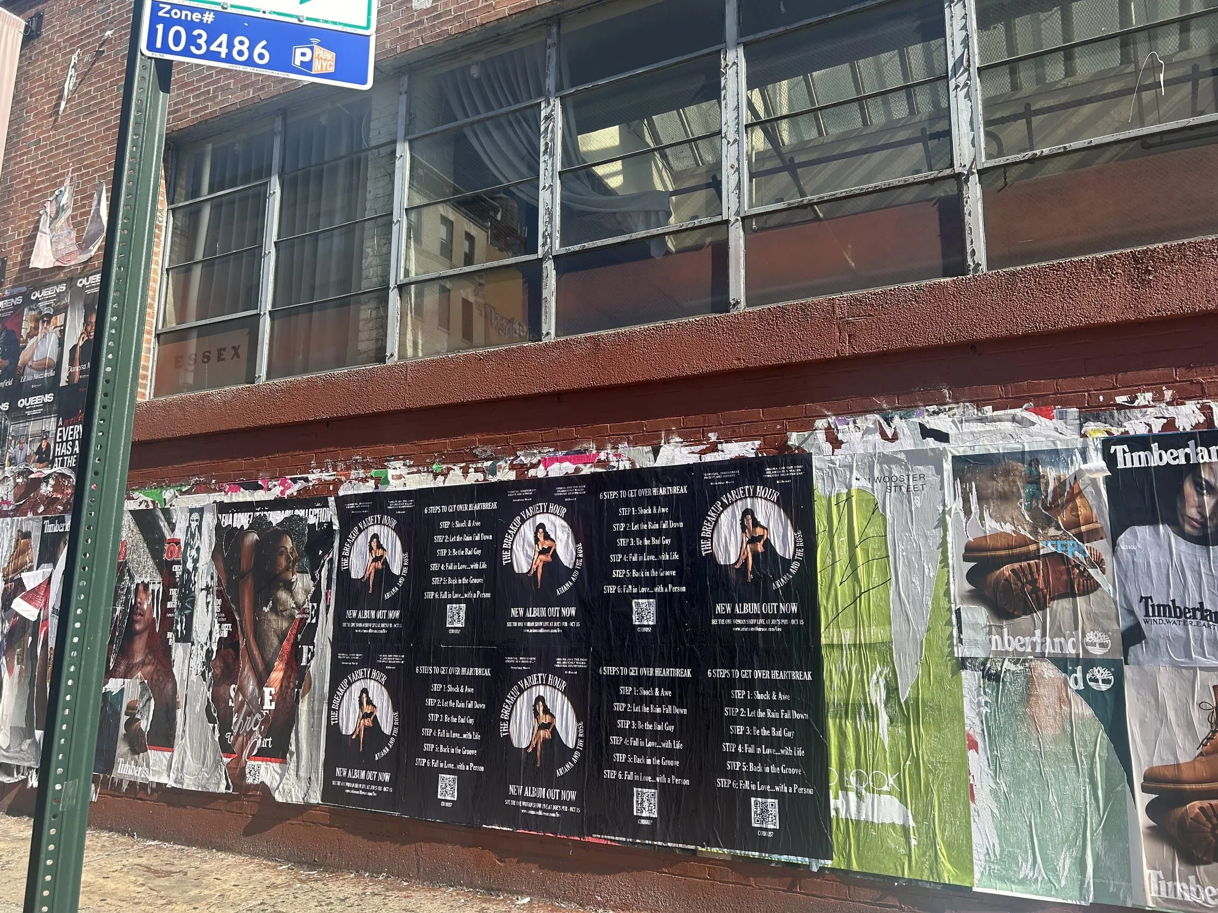 Ariana and the Rose 'The Breakup Variety Hour' wheatpaste album posters on Manhattan's Lower East Side, documented street install, by Beyond Street Media