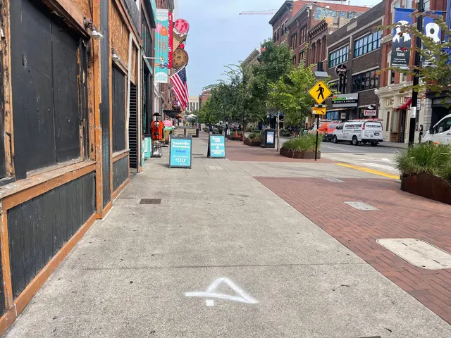 Avvoka sidewalk stencil and floor graphic in downtown Nashville by Beyond Street Media (photo 11 of 19).