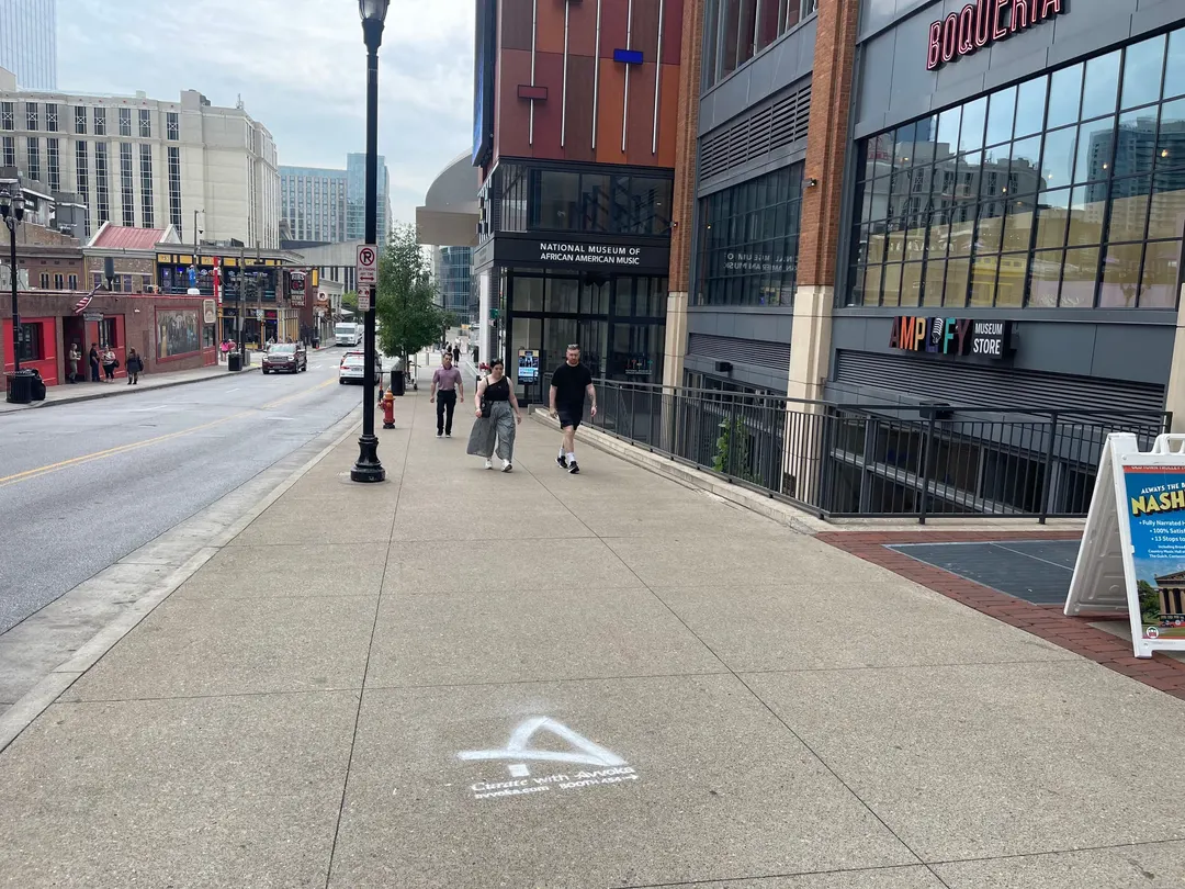 Avvoka sidewalk stencil and floor graphic in downtown Nashville by Beyond Street Media (photo 4 of 19).