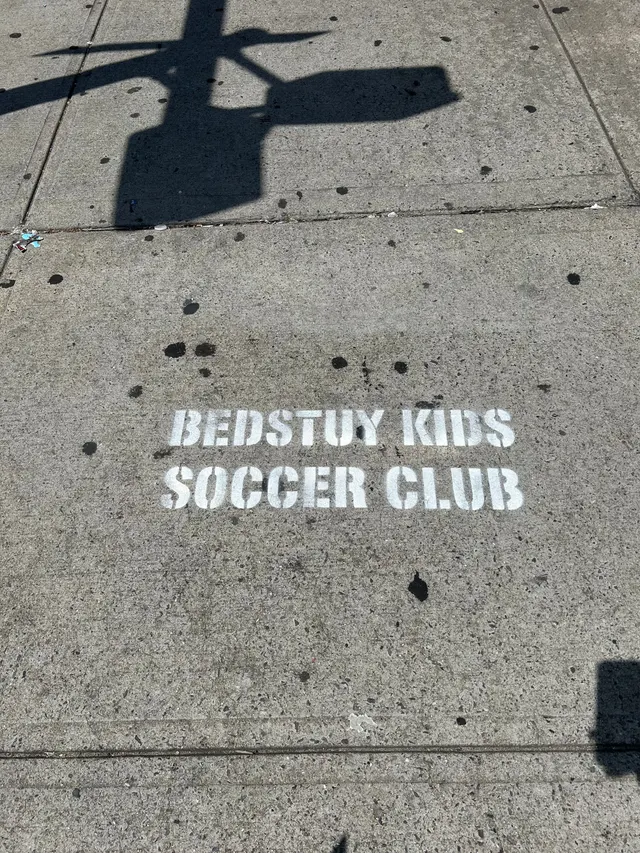 Sidewalk stencil for Bedstuy Kids Soccer Club in Bed-Stuy, Brooklyn NY by Beyond Street Media (photo 7 of 10).