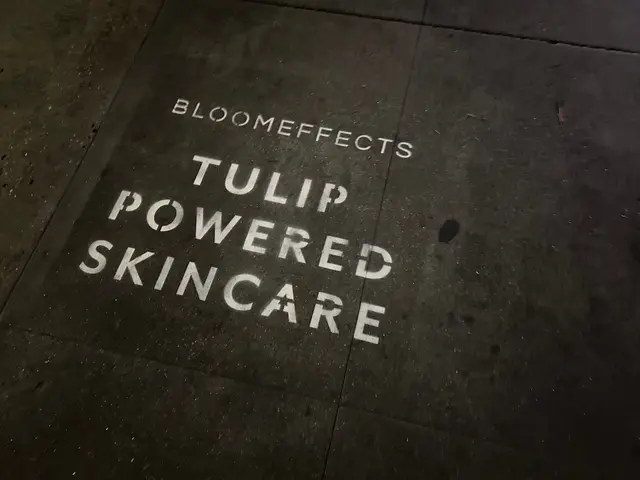 Sidewalk stencil install for Bloomeffects 'Tulip Powered Skincare' on New York City sidewalk in New York City - white stencil with tulip flower mark on concrete by Beyond Street Media (photo 1 of 12).