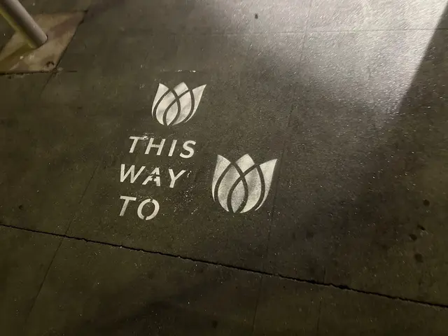 Sidewalk stencil install for Bloomeffects 'Tulip Powered Skincare' on New York City sidewalk in New York City - white stencil with tulip flower mark on concrete by Beyond Street Media (photo 10 of 12).