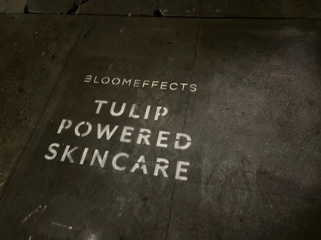 Sidewalk stencil install for Bloomeffects 'Tulip Powered Skincare' on New York City sidewalk in New York City - white stencil with tulip flower mark on concrete by Beyond Street Media (photo 12 of 12).