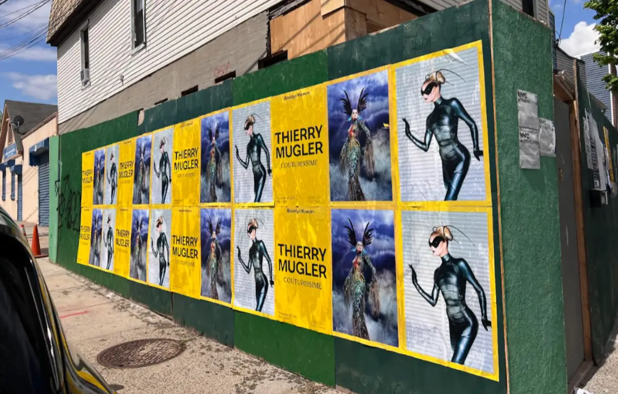 Brooklyn Museum 'Thierry Mugler: Couturissime' exhibition wheatpaste poster in Brooklyn, NY by Beyond Street Media