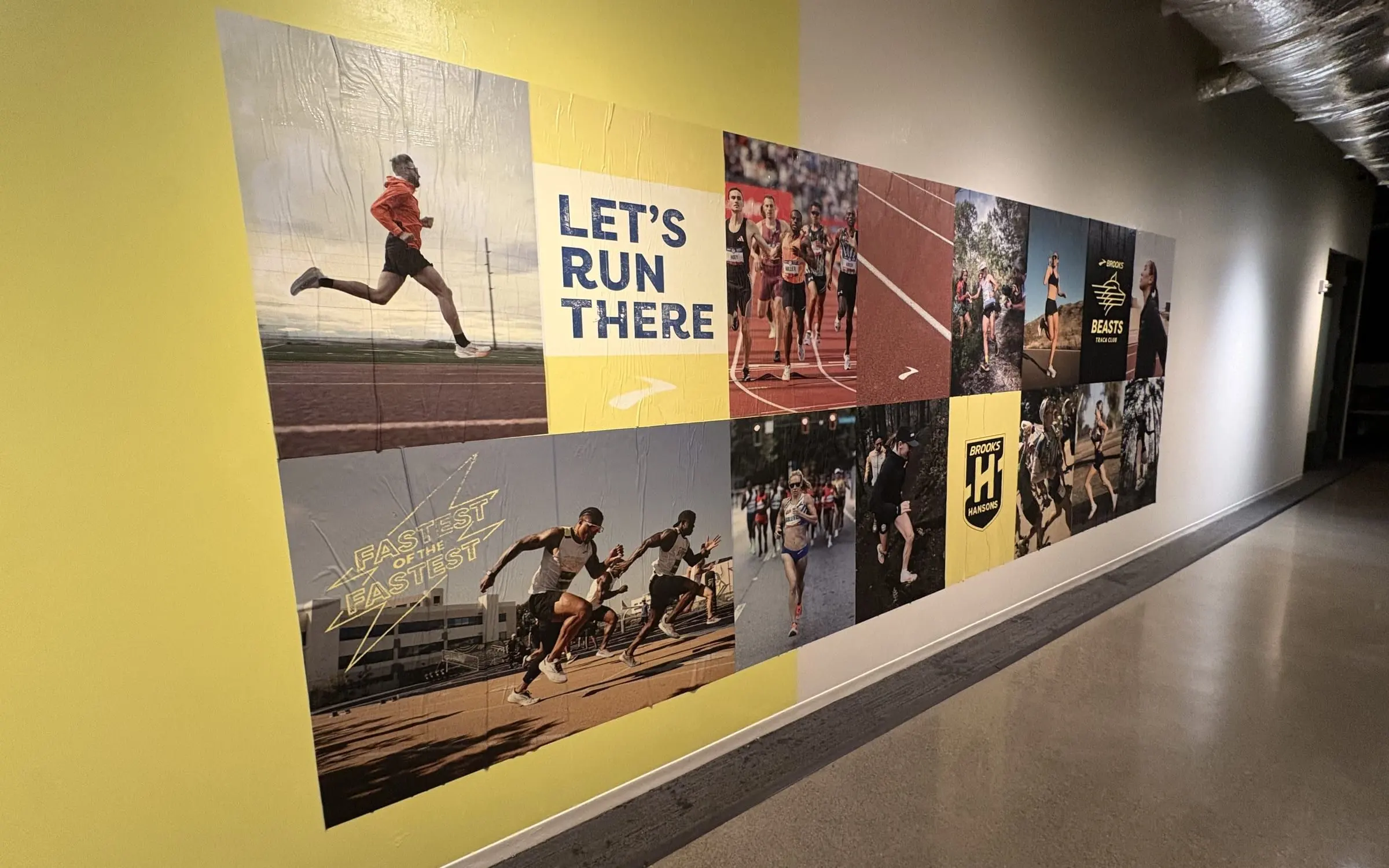 Brooks Running interior wheatpaste wall, in-office install