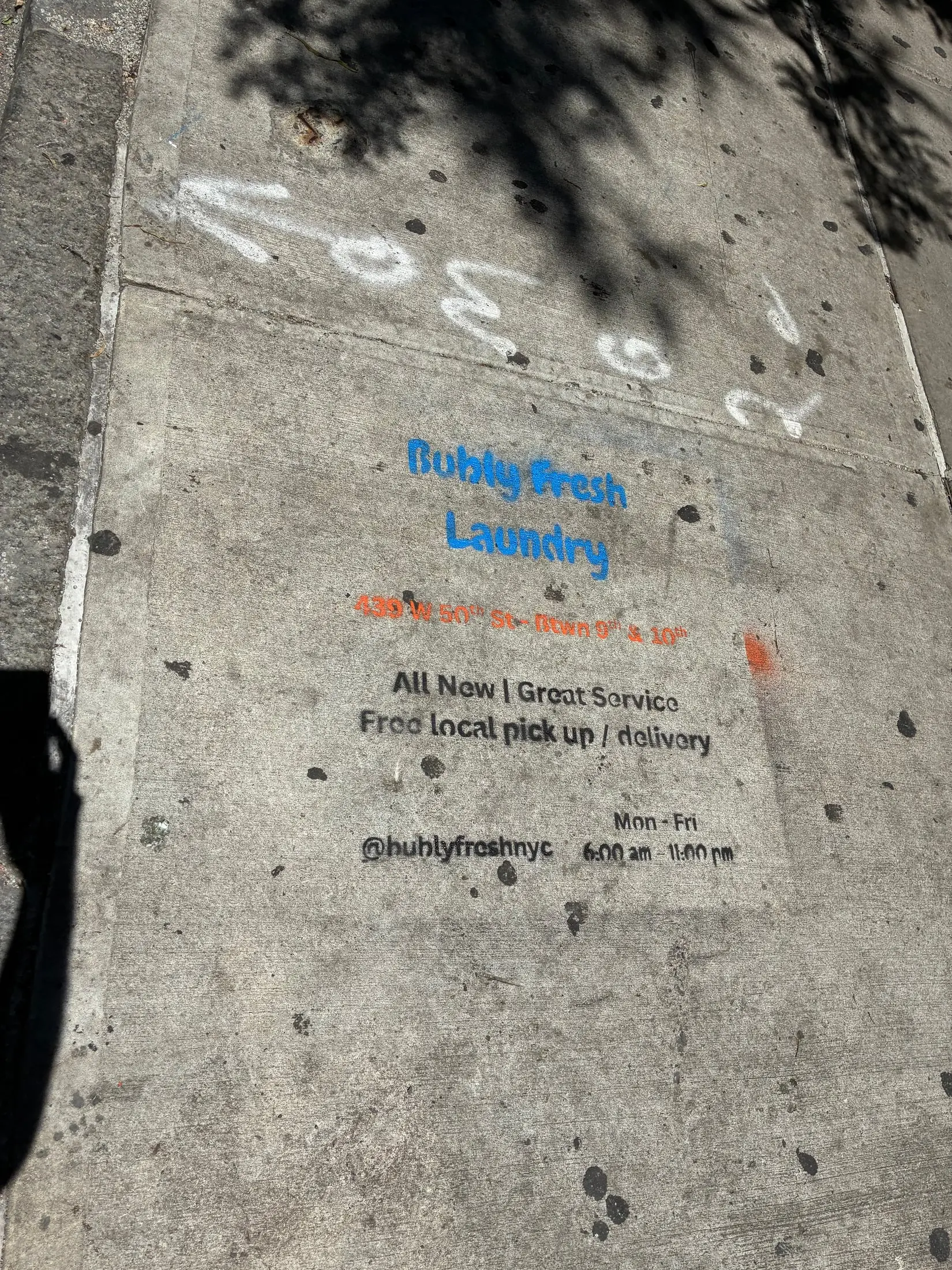 Bubly Fresh Laundry chalk sidewalk stencil in Hell's Kitchen, Manhattan (New York City, NY) by Beyond Street Media
