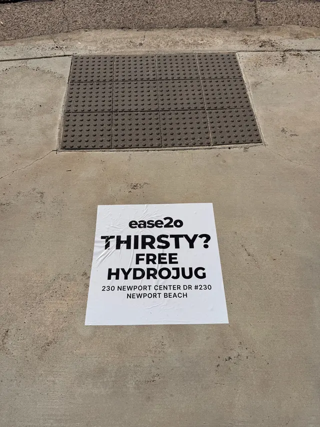 ease2o pop-up pole sticker on lamp post in Newport Beach, CA by Beyond Street Media (photo 17 of 61).