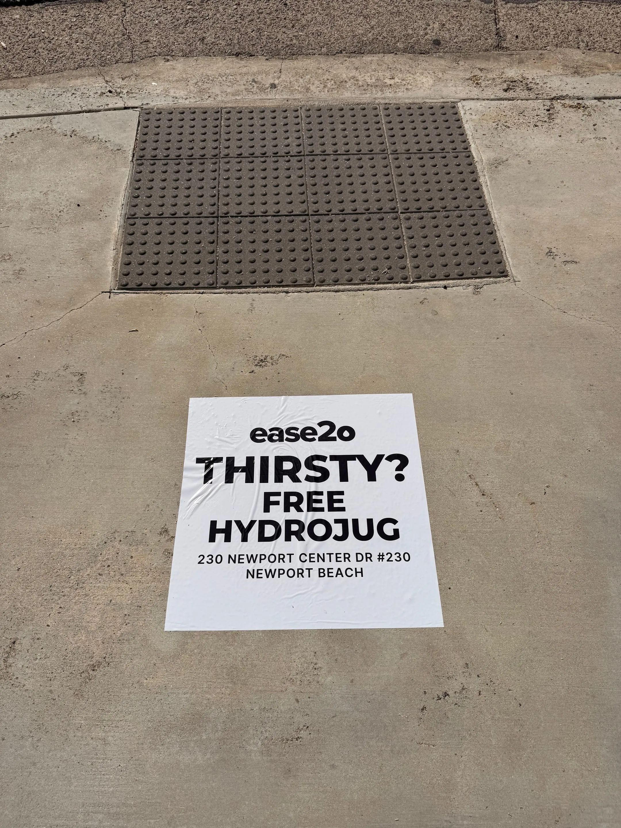 ease2o pop-up pole sticker on lamp post in Newport Beach, CA by Beyond Street Media