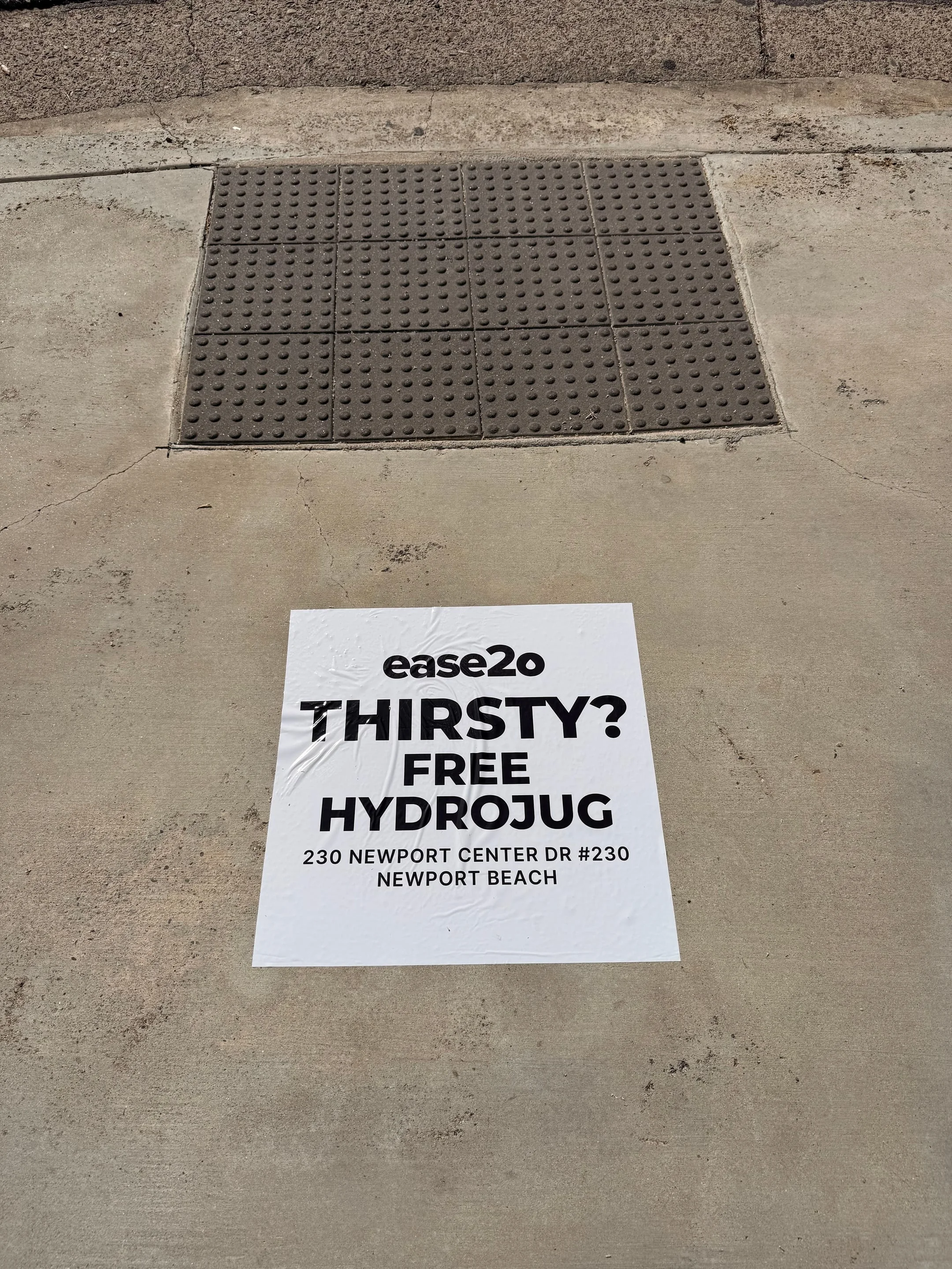 ease2o pop-up pole sticker on lamp post in Newport Beach, CA by Beyond Street Media