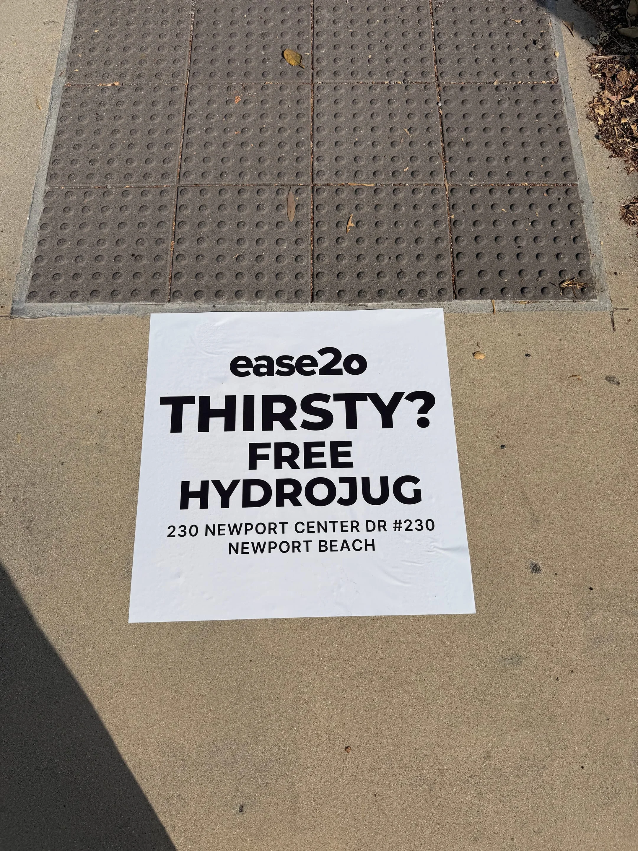 ease2o pop-up pole sticker on lamp post in Newport Beach, CA by Beyond Street Media