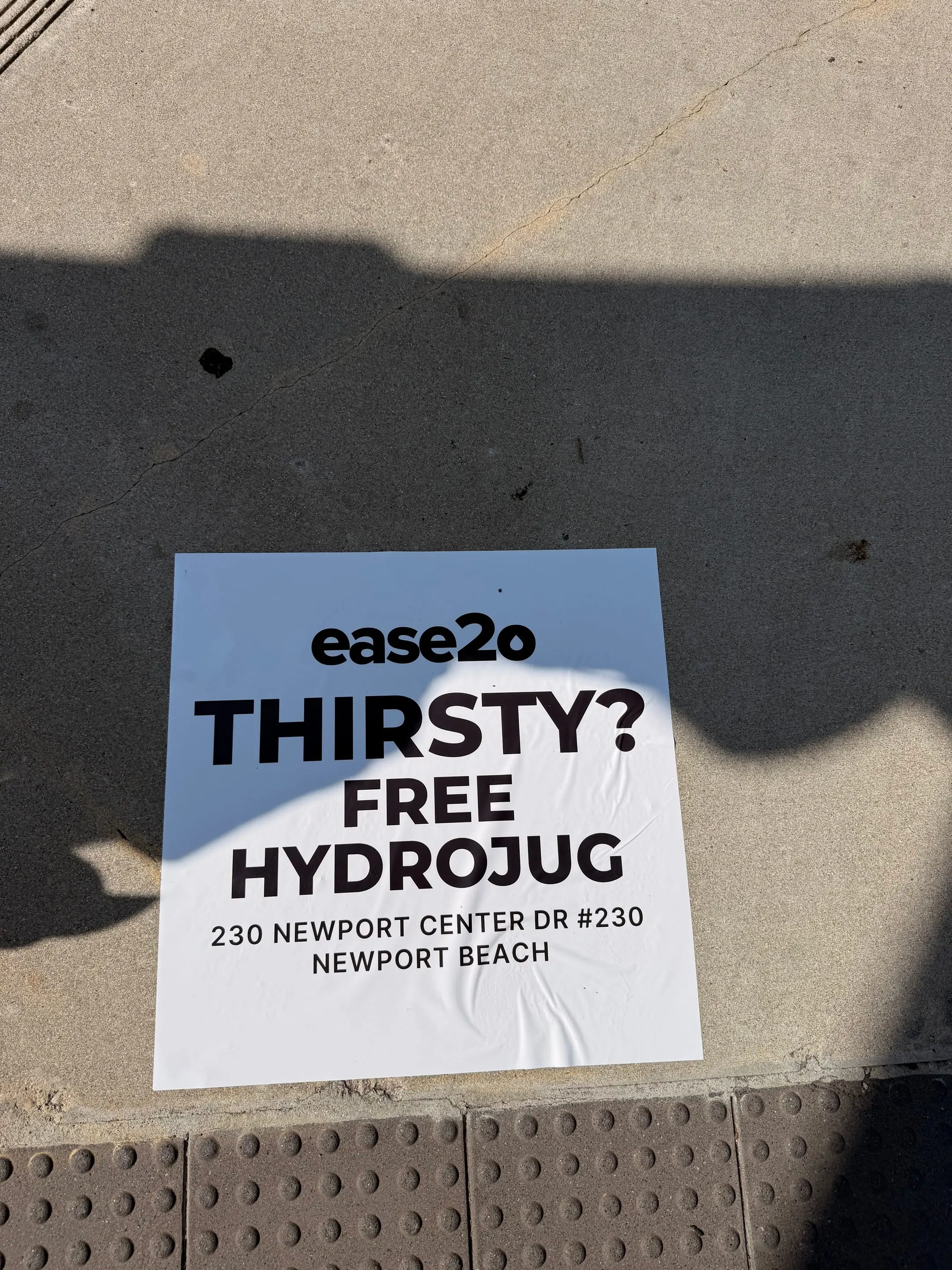 ease2o pop-up pole sticker on lamp post in Newport Beach, CA by Beyond Street Media