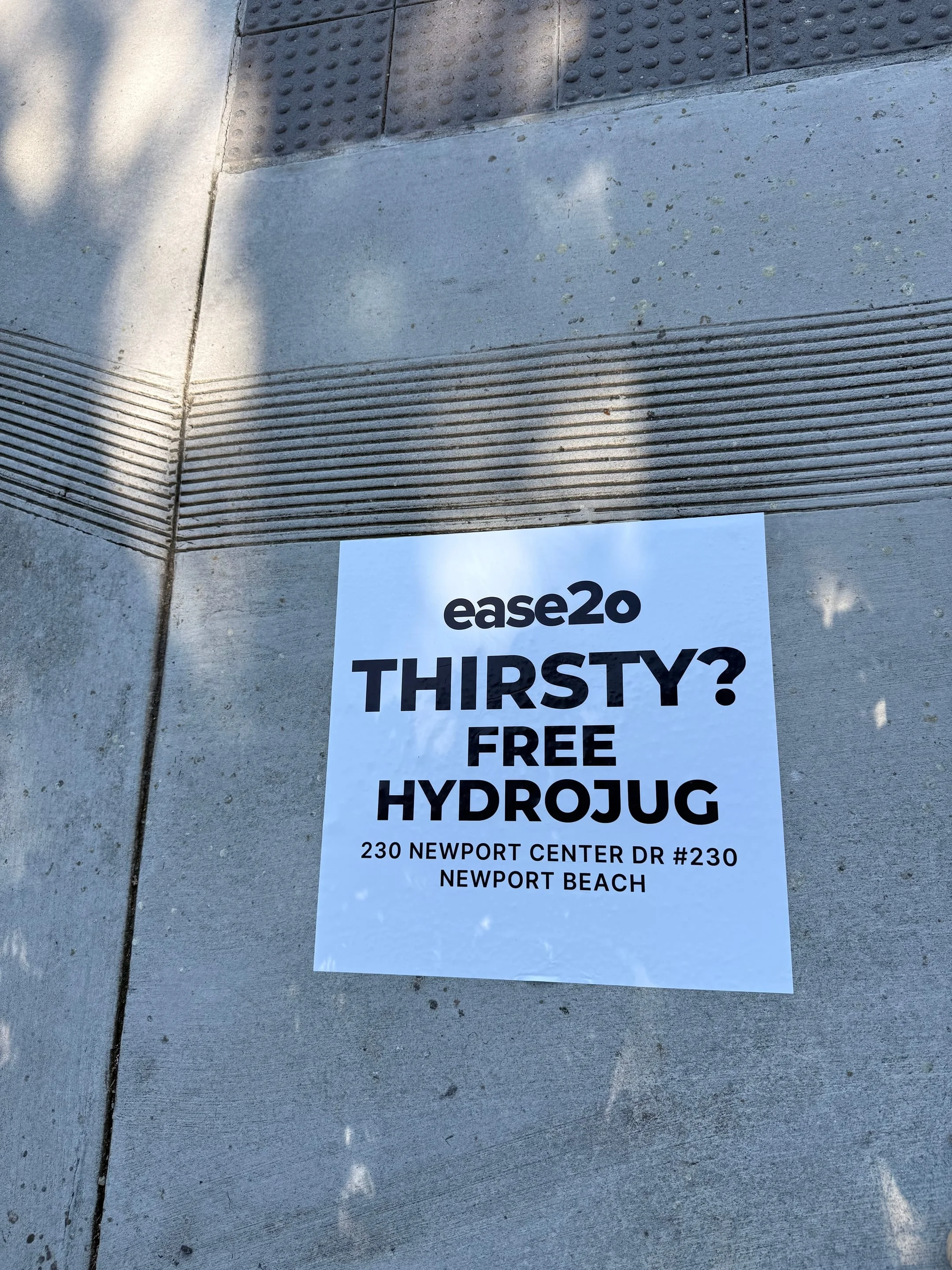 ease2o pop-up pole sticker on lamp post in Newport Beach, CA by Beyond Street Media