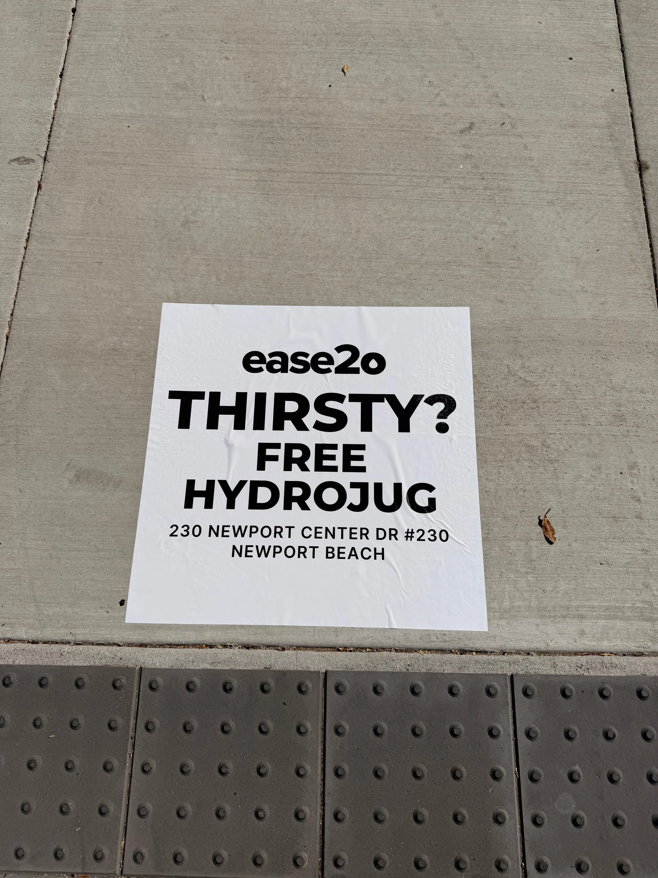 ease2o pop-up pole sticker on lamp post in Newport Beach, CA by Beyond Street Media
