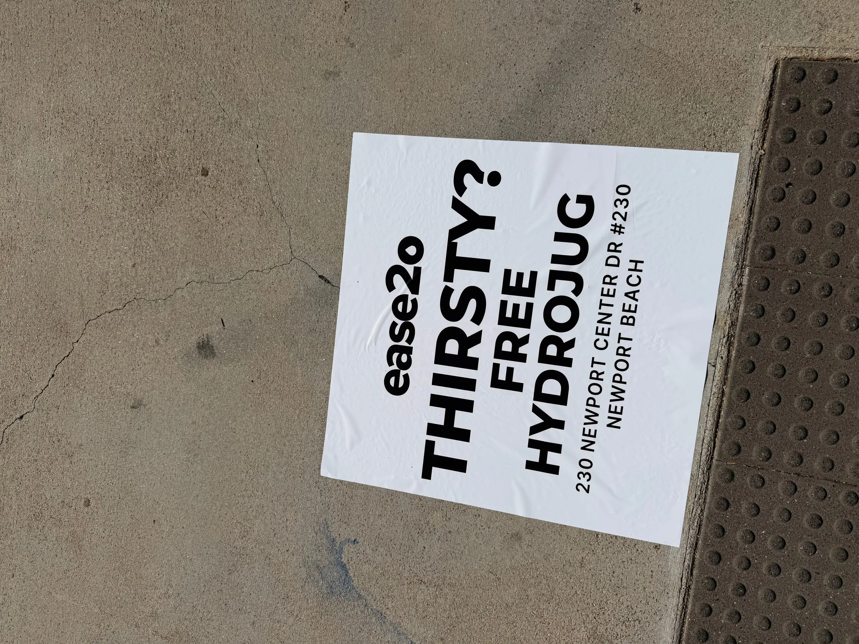 ease2o pop-up pole sticker on lamp post in Newport Beach, CA by Beyond Street Media
