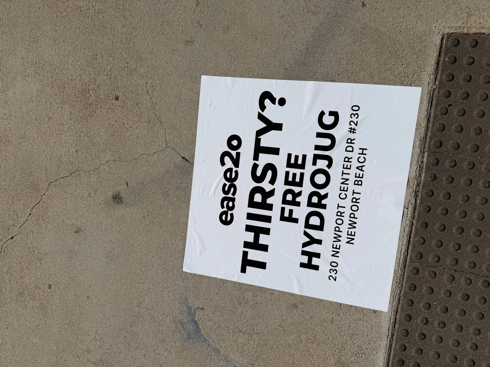 ease2o pop-up pole sticker on lamp post in Newport Beach, CA by Beyond Street Media
