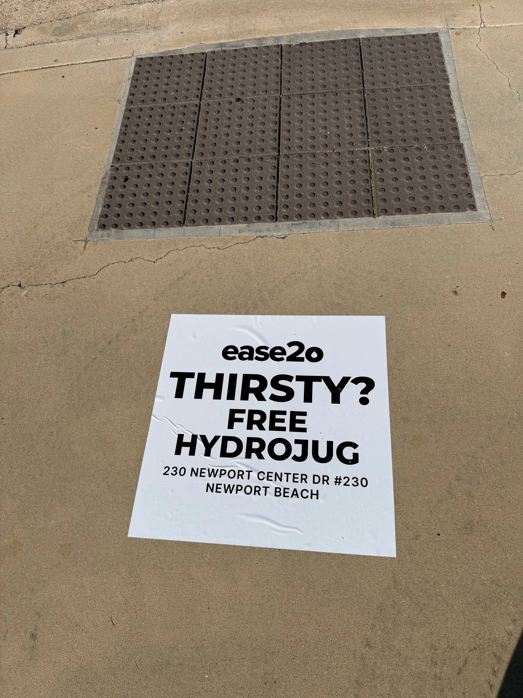 ease2o pop-up pole sticker on lamp post in Newport Beach, CA by Beyond Street Media