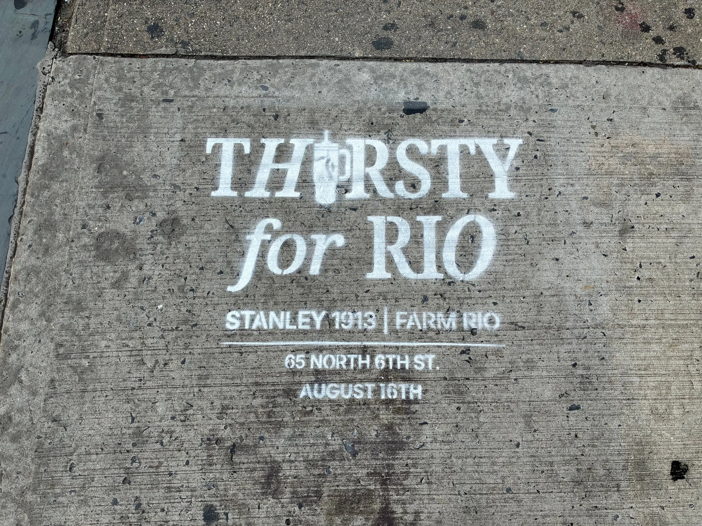 Farm Rio x Stanley 1913 Thirsty for Rio chalk stencil installed on a New York sidewalk by Beyond Street Media