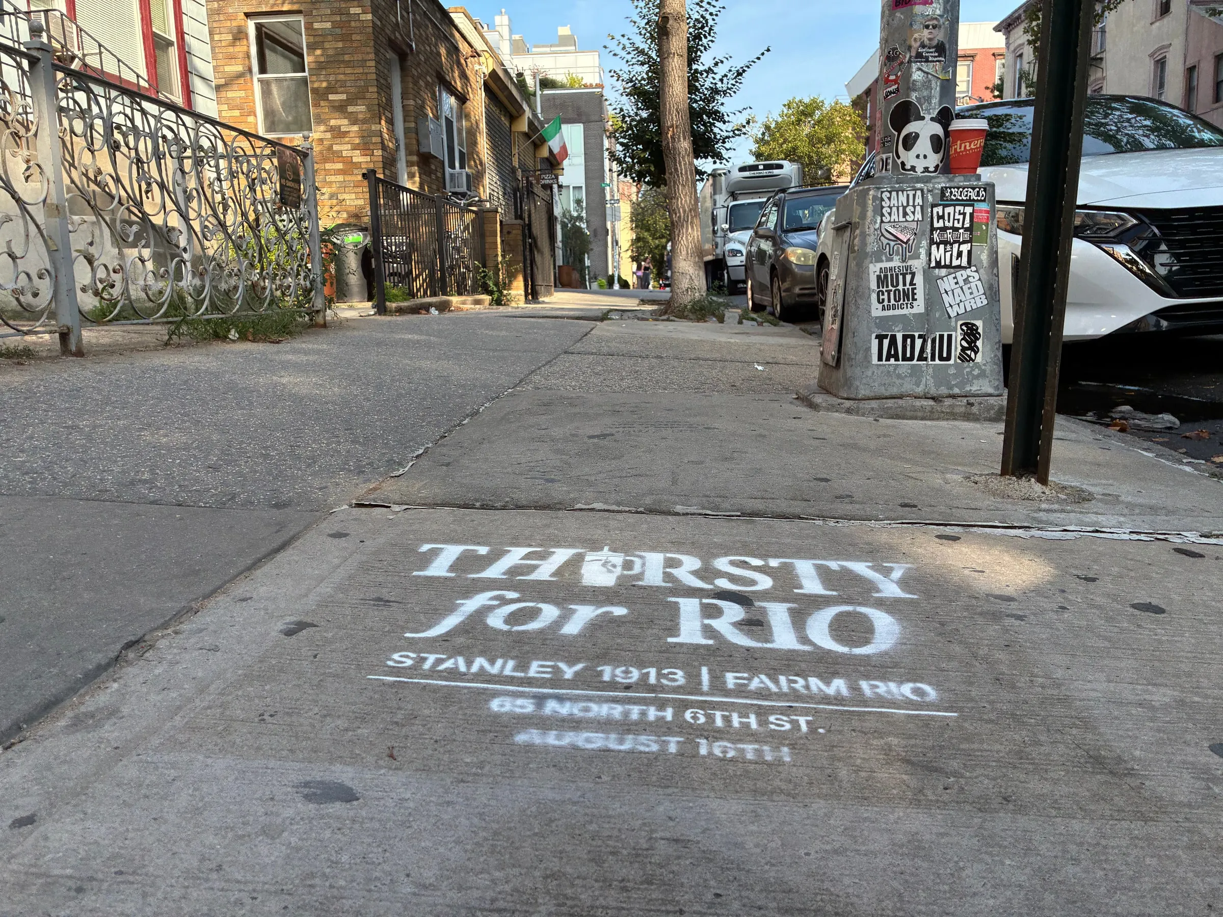Farm Rio x Stanley 1913 Thirsty for Rio chalk stencil installed on a New York sidewalk by Beyond Street Media