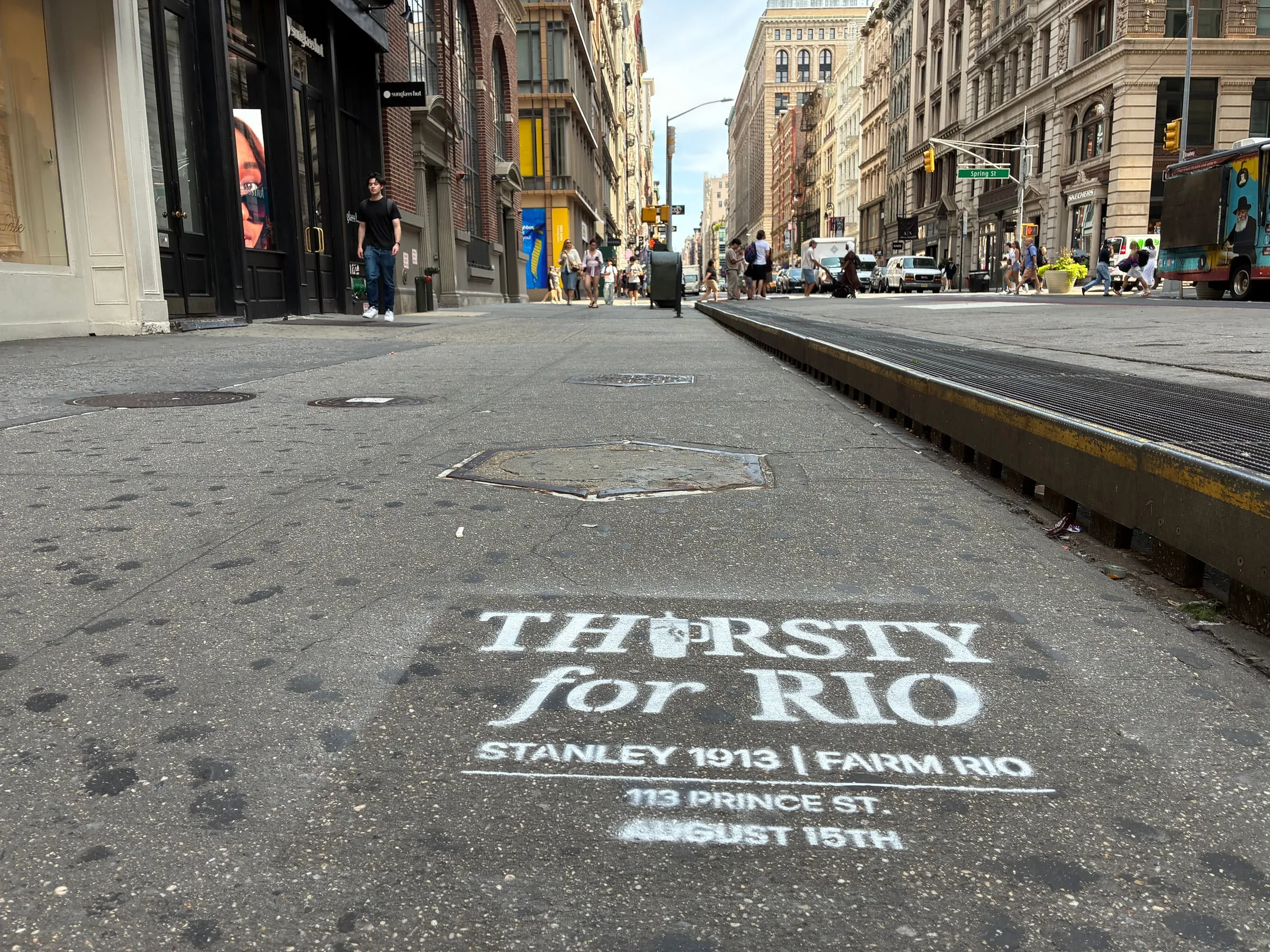 Farm Rio x Stanley 1913 Thirsty for Rio chalk stencil installed on a New York sidewalk by Beyond Street Media