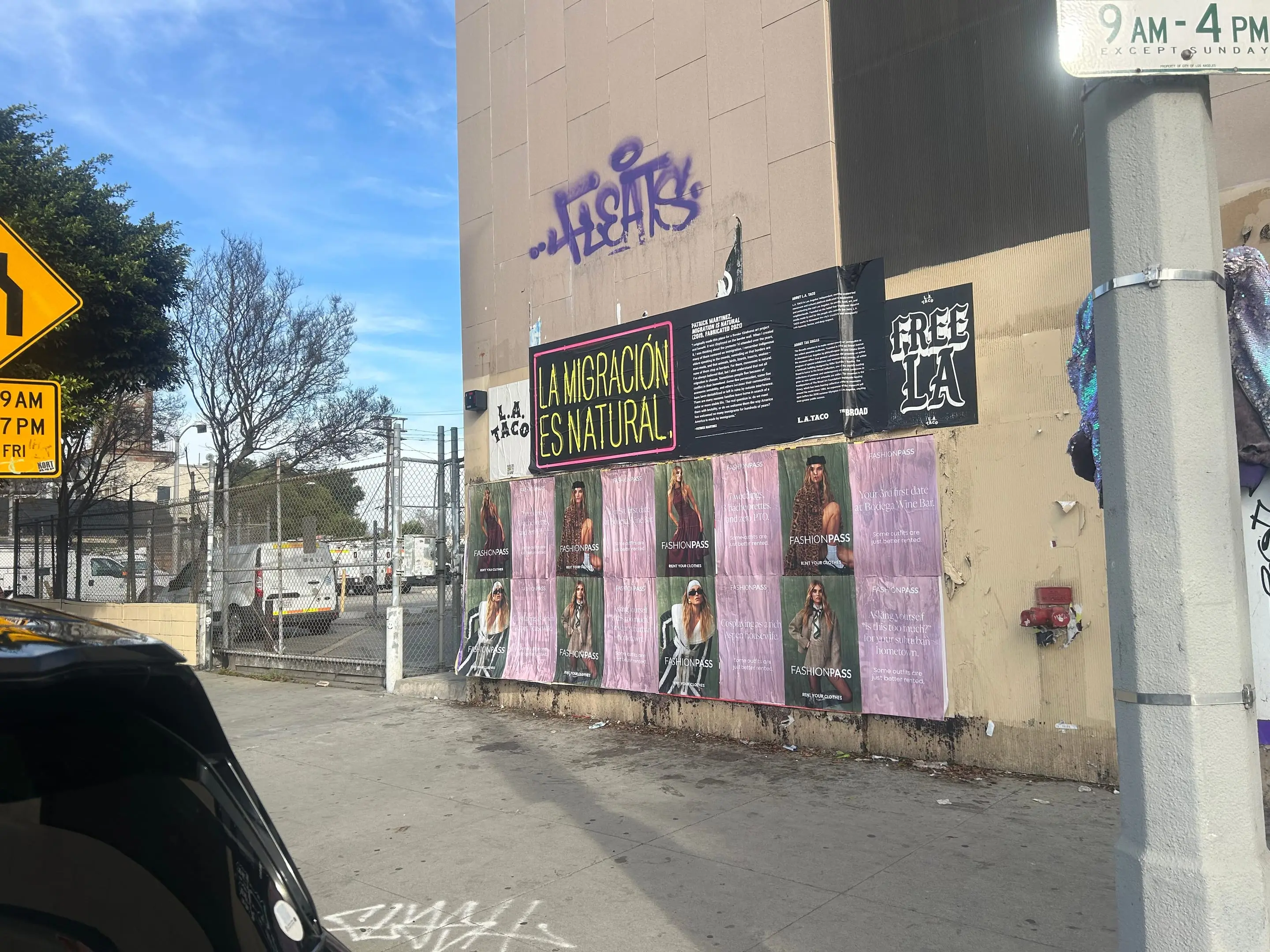 FashionPass pink wheatpaste poster in Los Angeles by Beyond Street Media