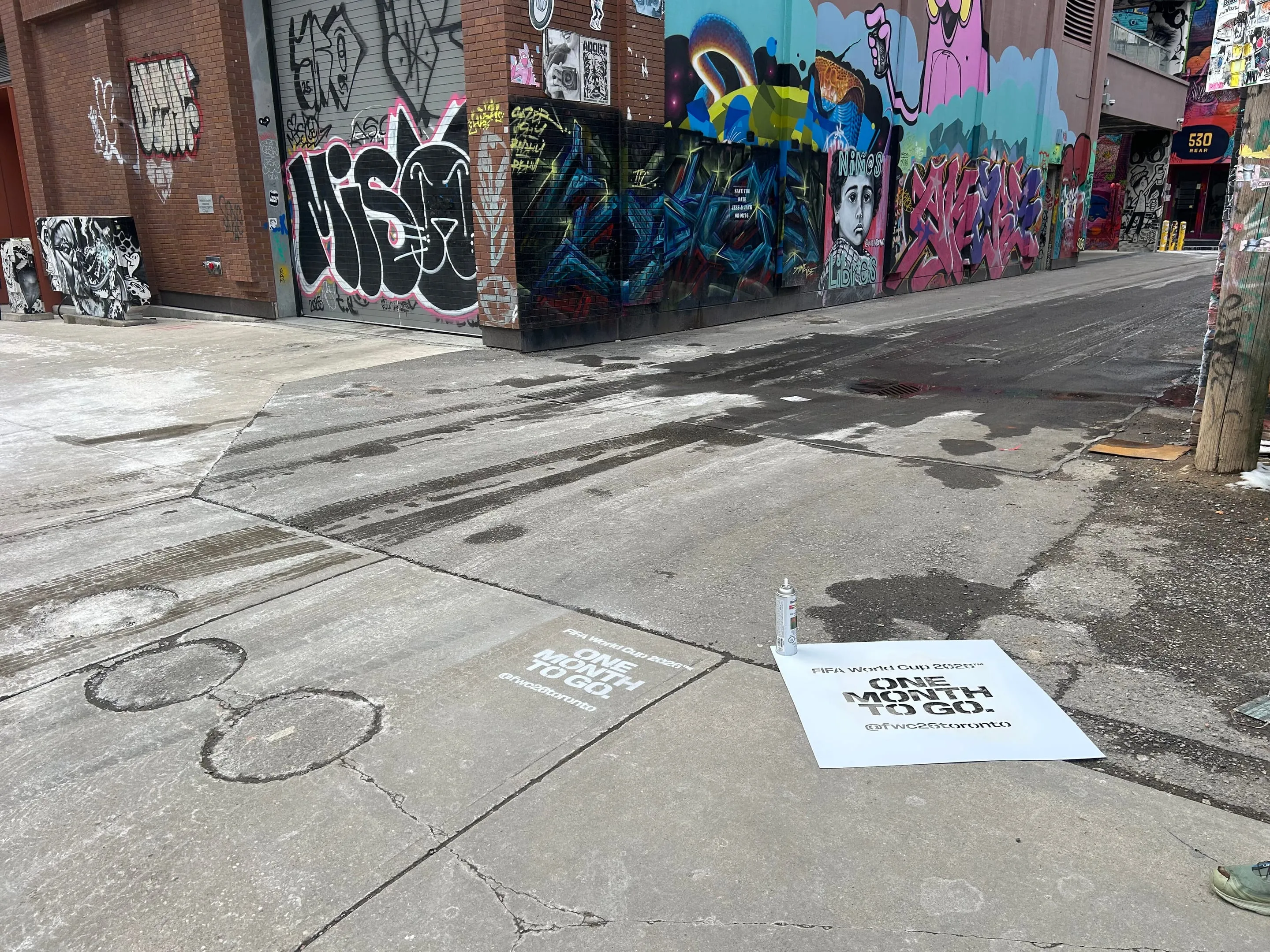 Beyond Street Media crew documenting a FIFA World Cup 2026 stencil install in Toronto