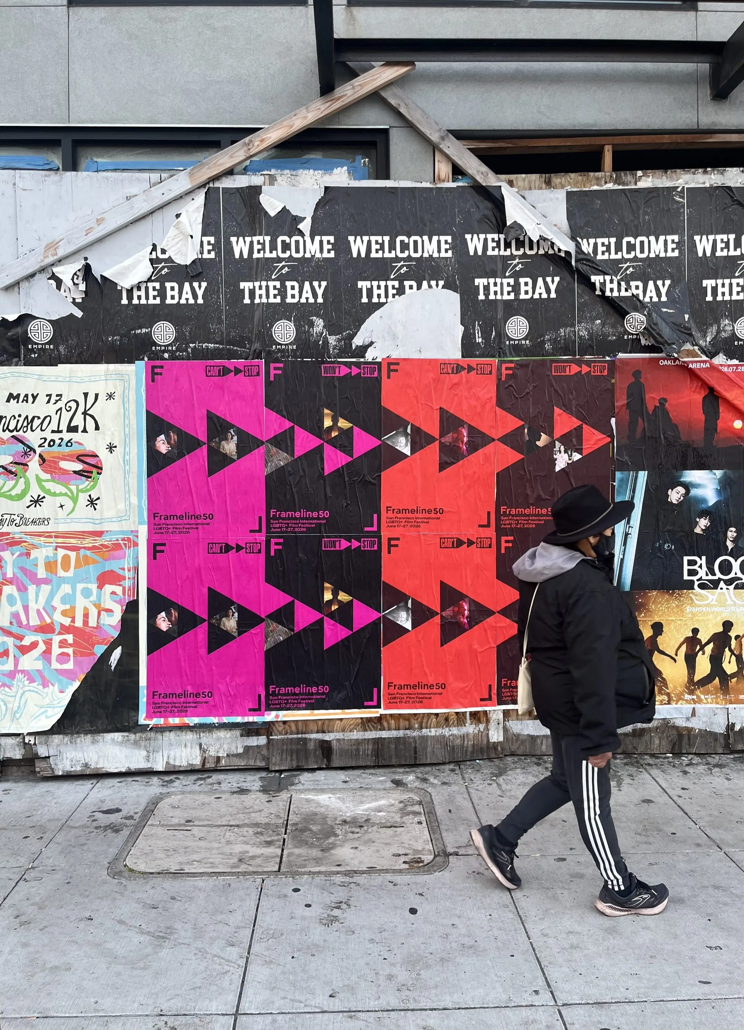 Frameline50 LGBTQ+ film festival wheatpaste posters in San Francisco, documented street install, by Beyond Street Media