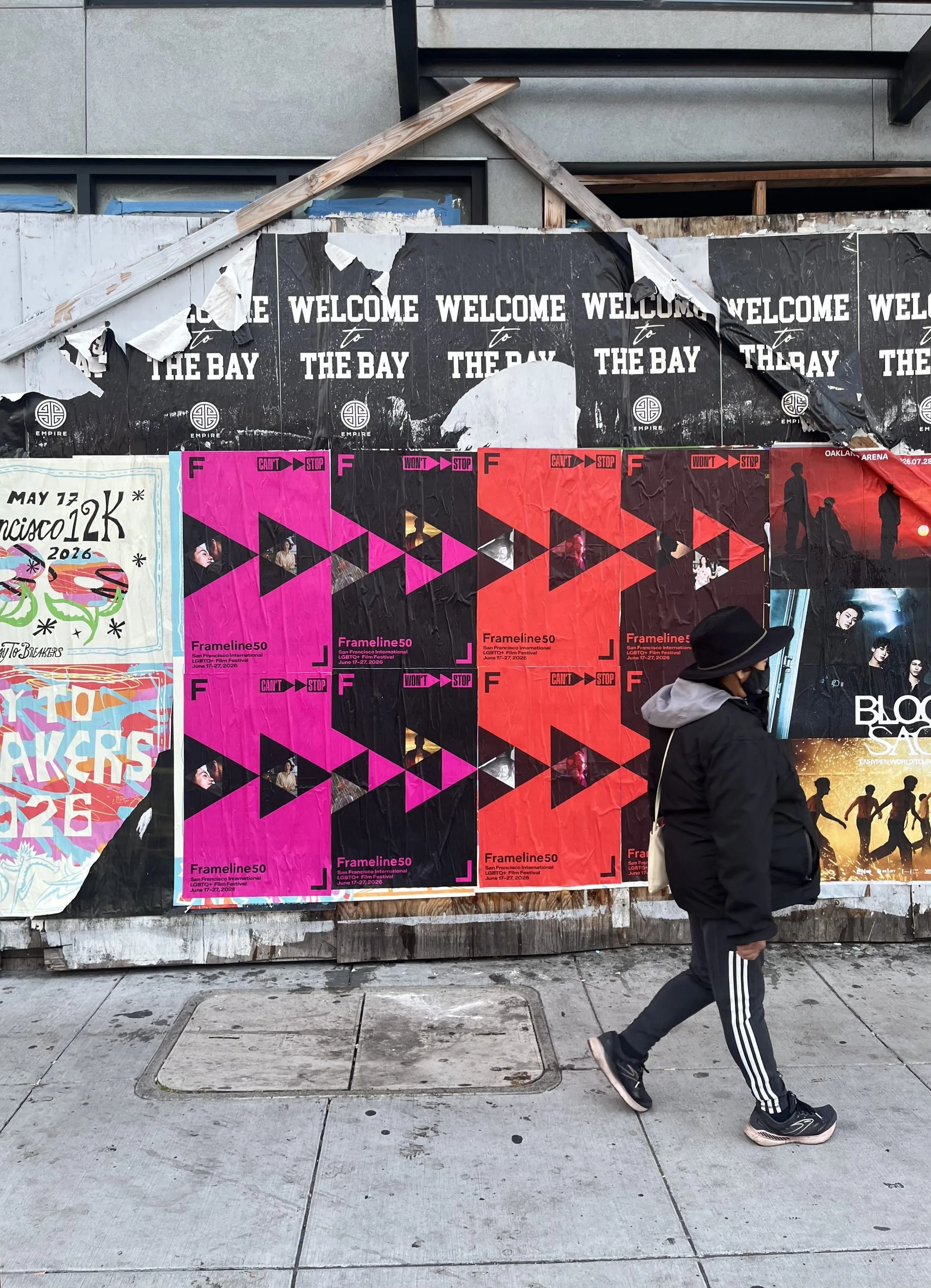 Frameline50 LGBTQ+ film festival wheatpaste posters in San Francisco, documented street install, by Beyond Street Media