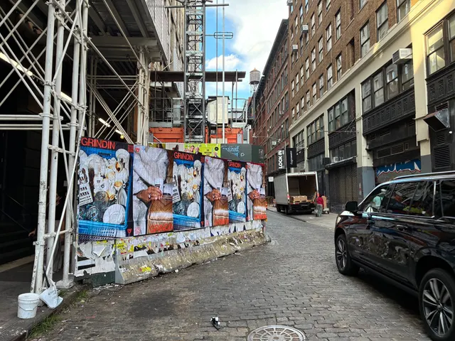 Grindin jumbo wheatpaste poster on a construction hoarding in New York City, installed by Beyond Street Media (photo 29 of 337).