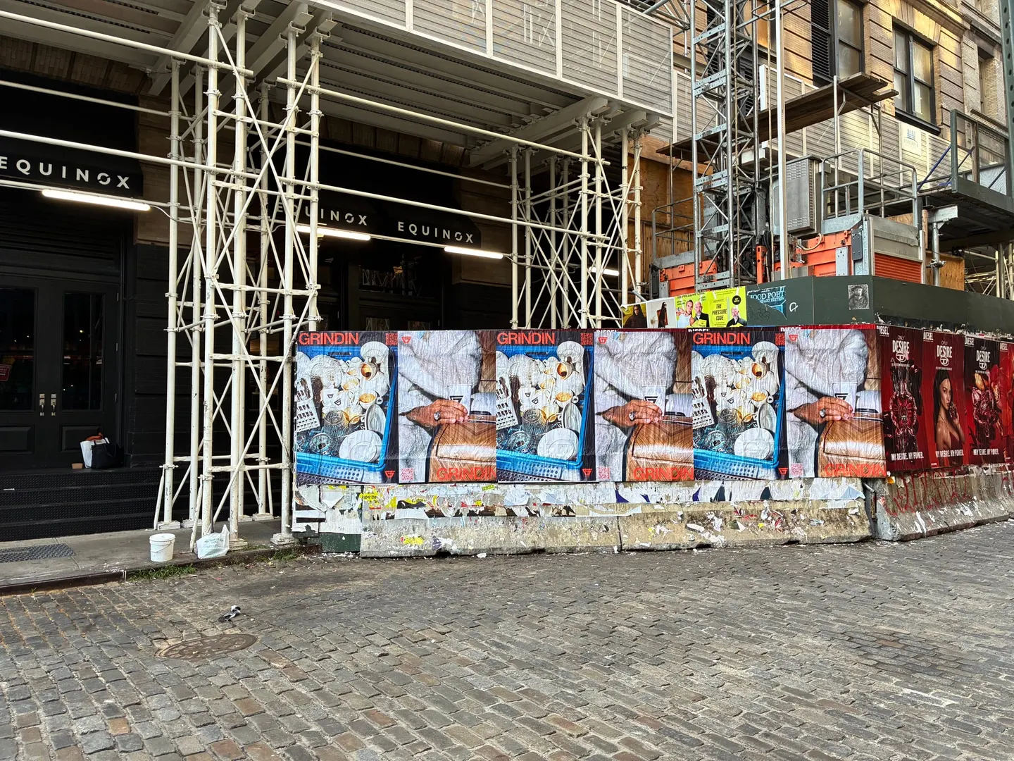 Grindin jumbo wheatpaste poster on a construction hoarding in New York City, installed by Beyond Street Media (photo 1 of 337).