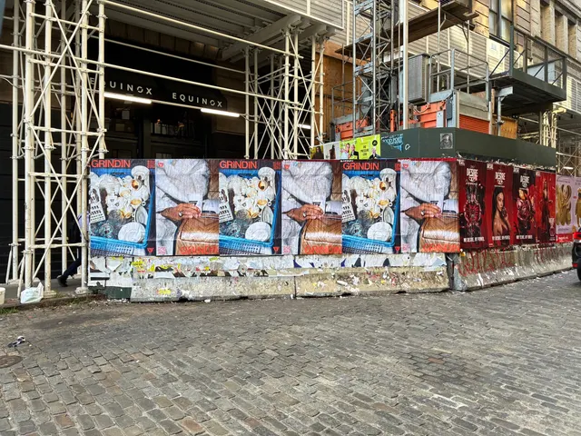 Grindin jumbo wheatpaste poster on a construction hoarding in New York City, installed by Beyond Street Media (photo 11 of 337).