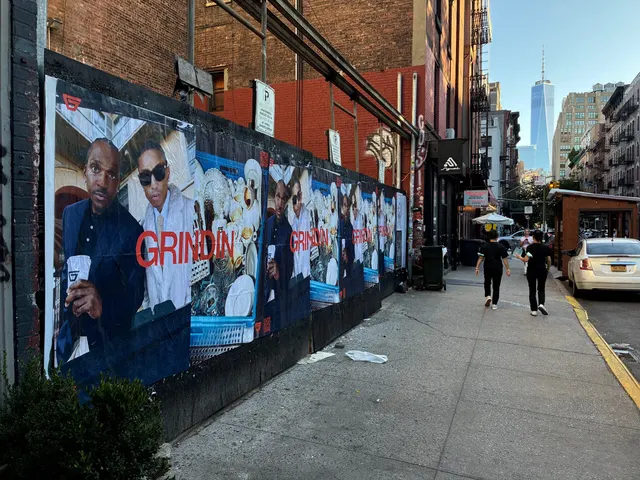 Grindin jumbo wheatpaste poster on a construction hoarding in New York City, installed by Beyond Street Media (photo 24 of 337).