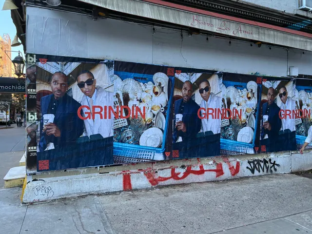 Grindin jumbo wheatpaste poster on a construction hoarding in New York City, installed by Beyond Street Media (photo 15 of 337).