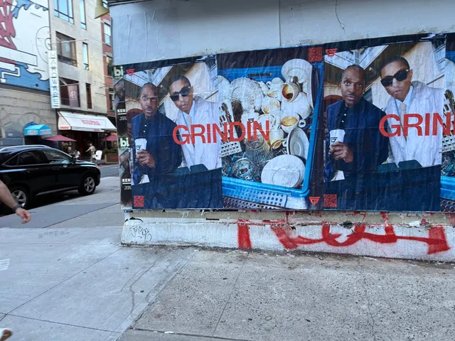 Grindin jumbo wheatpaste poster on a construction hoarding in New York City, installed by Beyond Street Media (photo 16 of 337).