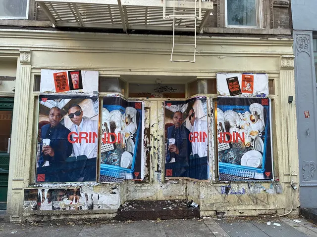 Grindin jumbo wheatpaste poster on a construction hoarding in New York City, installed by Beyond Street Media (photo 17 of 337).