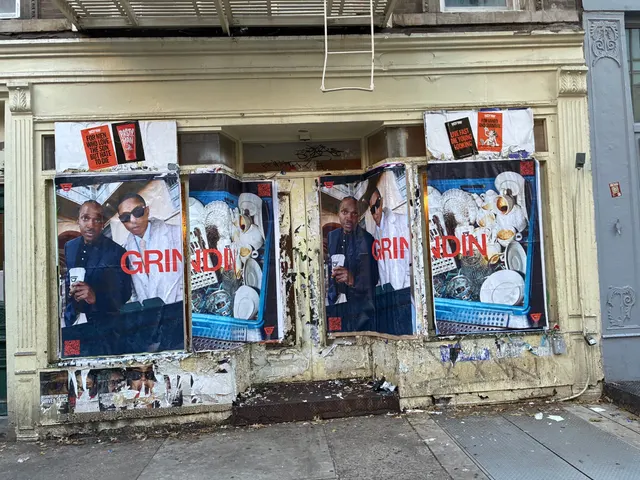 Grindin jumbo wheatpaste poster on a construction hoarding in New York City, installed by Beyond Street Media (photo 25 of 337).