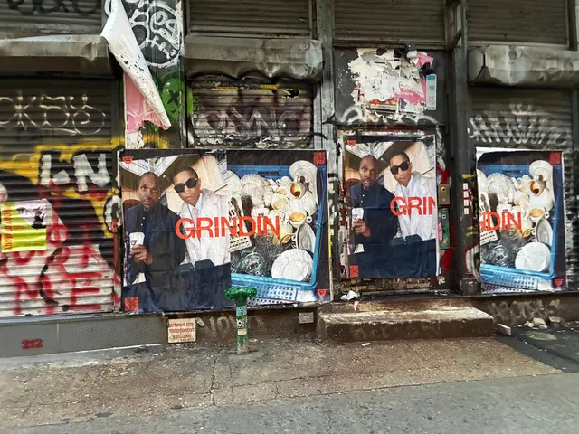 Grindin jumbo wheatpaste poster on a construction hoarding in New York City, installed by Beyond Street Media (photo 26 of 337).
