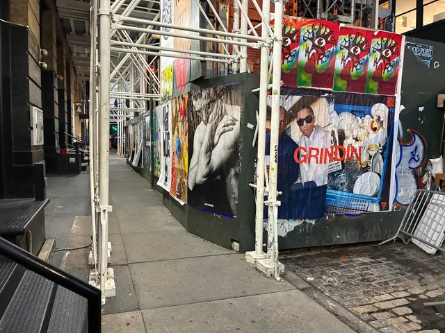 Grindin jumbo wheatpaste poster on a construction hoarding in New York City, installed by Beyond Street Media (photo 21 of 337).