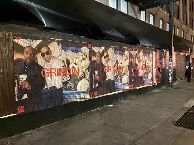 Grindin jumbo wheatpaste poster on a construction hoarding in New York City, installed by Beyond Street Media (photo 7 of 337).