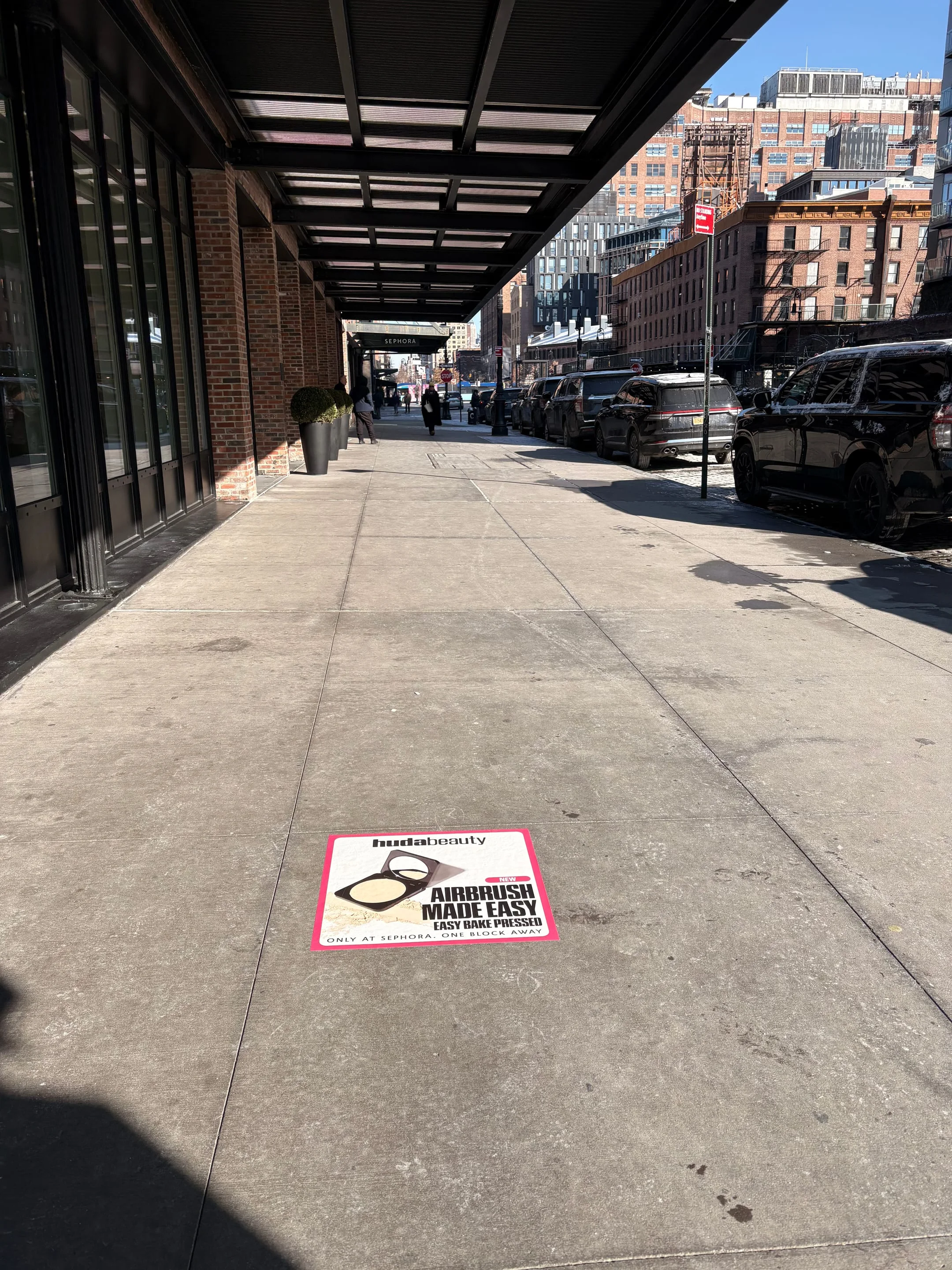 Huda Beauty sidewalk decal in New York City, New York City by Beyond Street Media