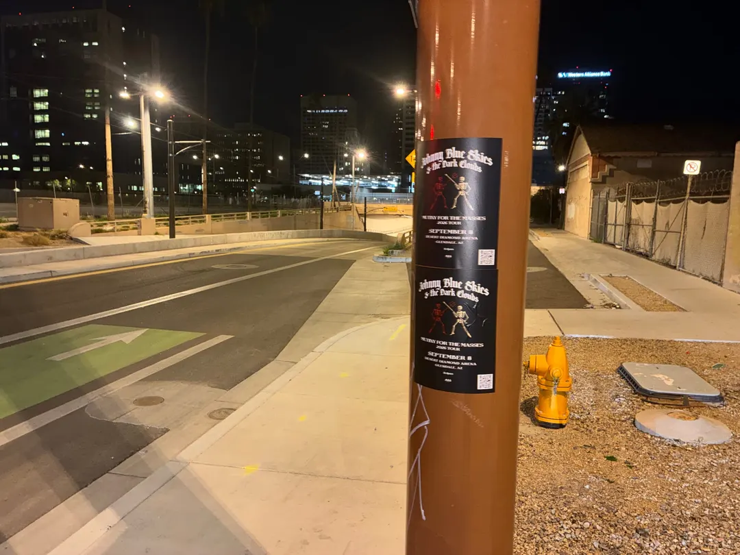 Johnny Blue Skies pole snipe in downtown Phoenix by Beyond Street Media (photo 3 of 103).