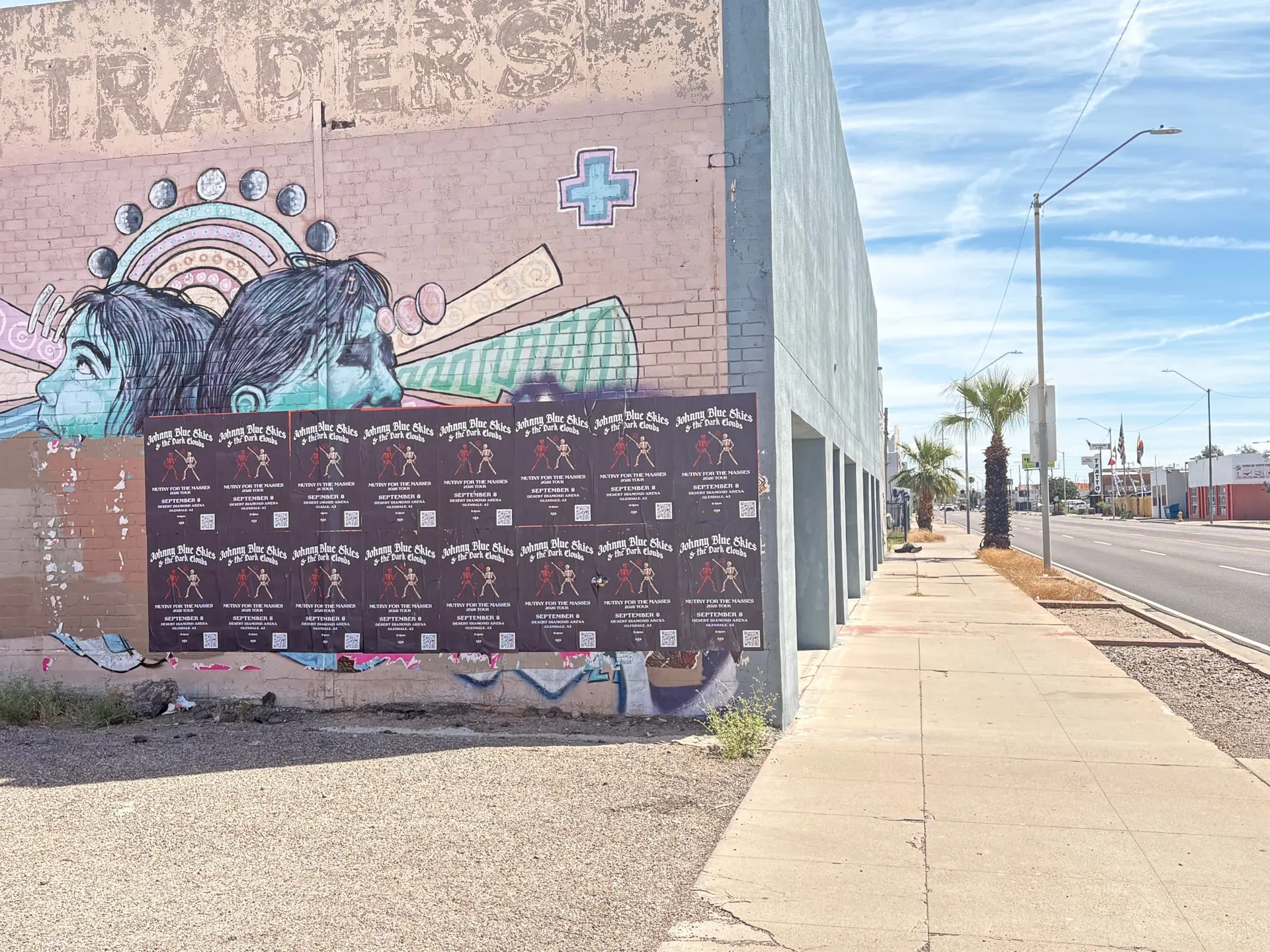 Johnny Blue Skies wheatpaste show poster in downtown Phoenix by Beyond Street Media