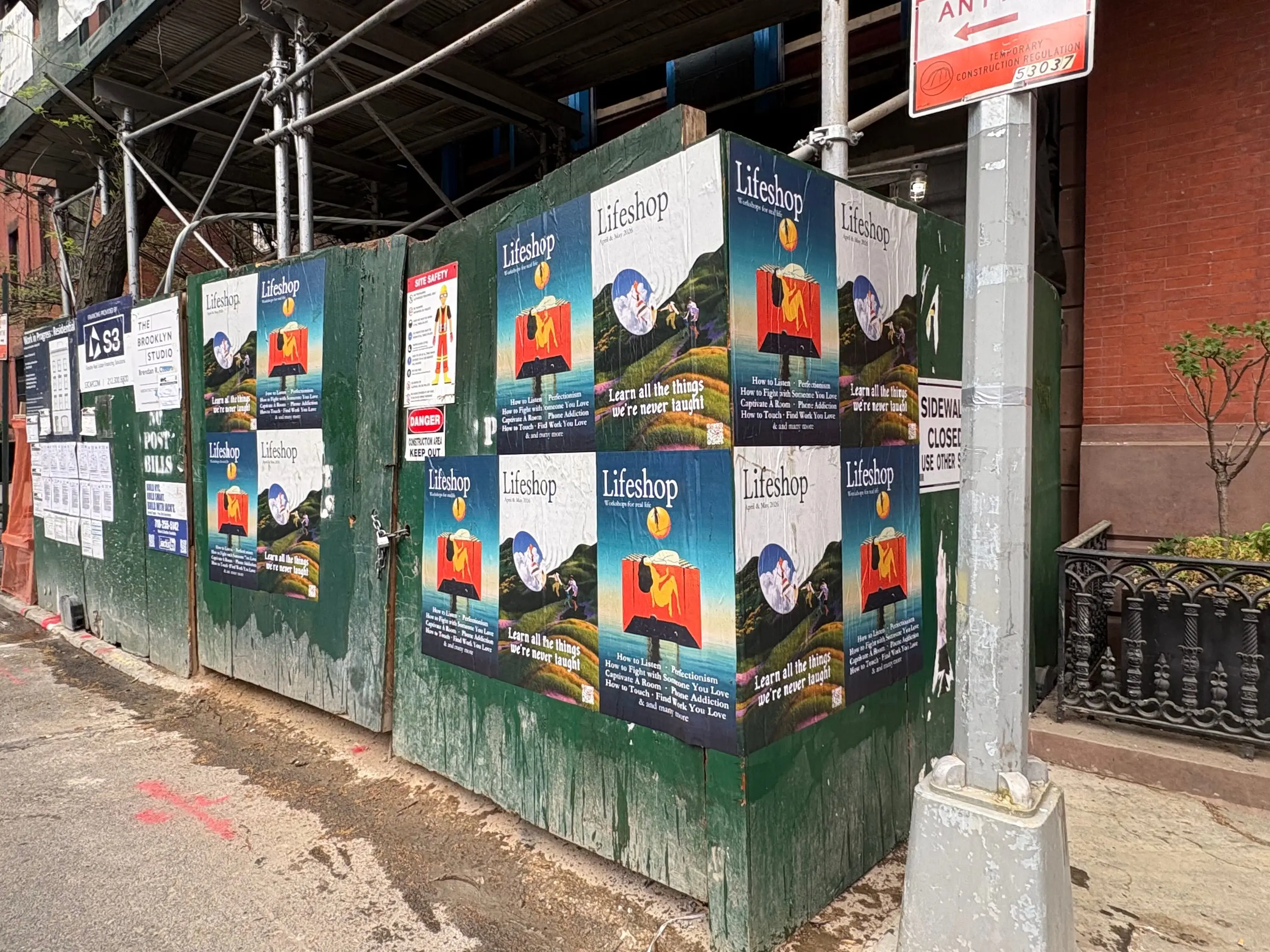 Lifeshop 'Learn all the things we're never taught' wheatpaste in New York City (Williamsburg scaffolding) by Beyond Street Media