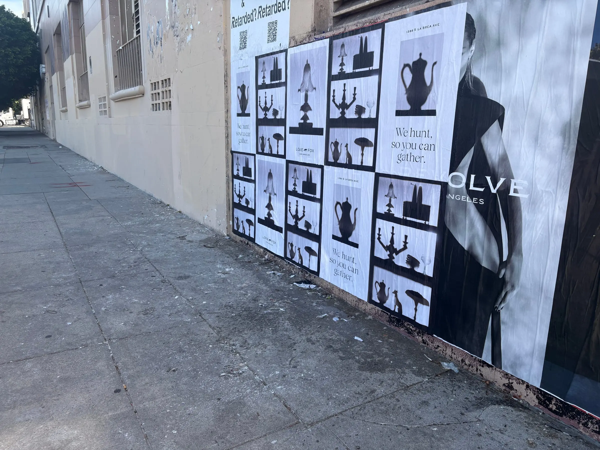 Lone Fox 'We hunt, so you can gather' wheatpaste poster campaign on documented walls in Los Angeles, CA by Beyond Street Media