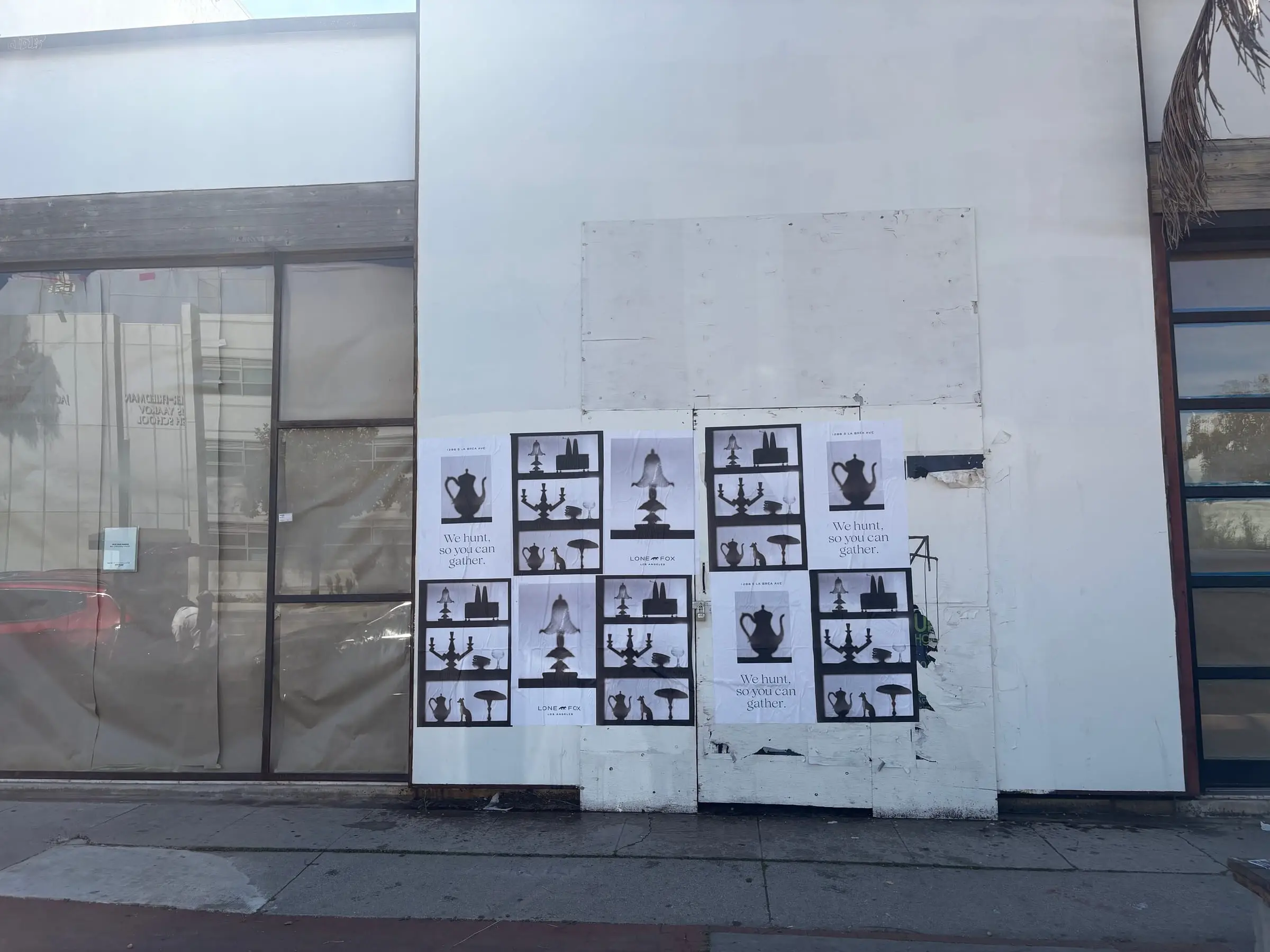 Lone Fox 'We hunt, so you can gather' wheatpaste poster campaign on documented walls in Los Angeles, CA by Beyond Street Media