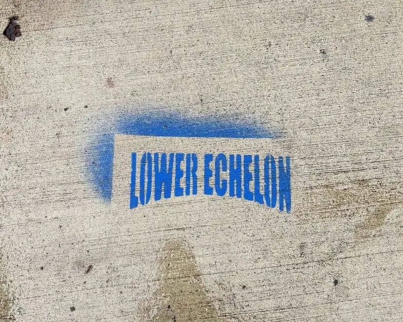 Lower Echelon brand sidewalk stencil in New York City, NY by Beyond Street Media