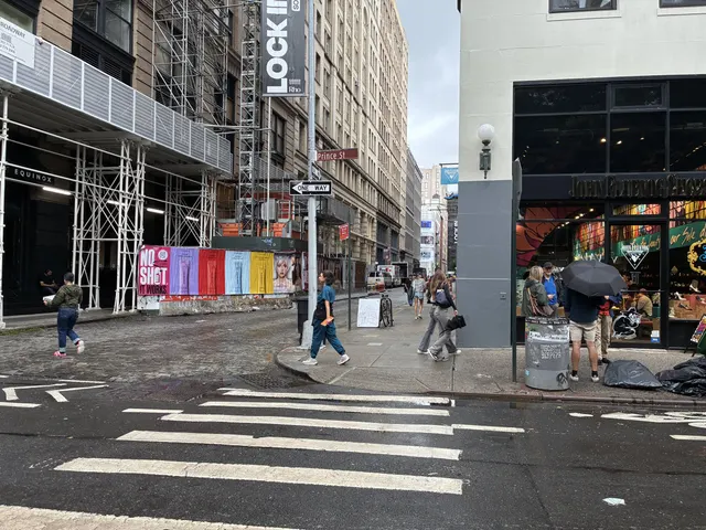 Momentm wheatpaste, stencil and takeaway poster campaign across SoHo, the Lower East Side and Williamsburg by Beyond Street Media