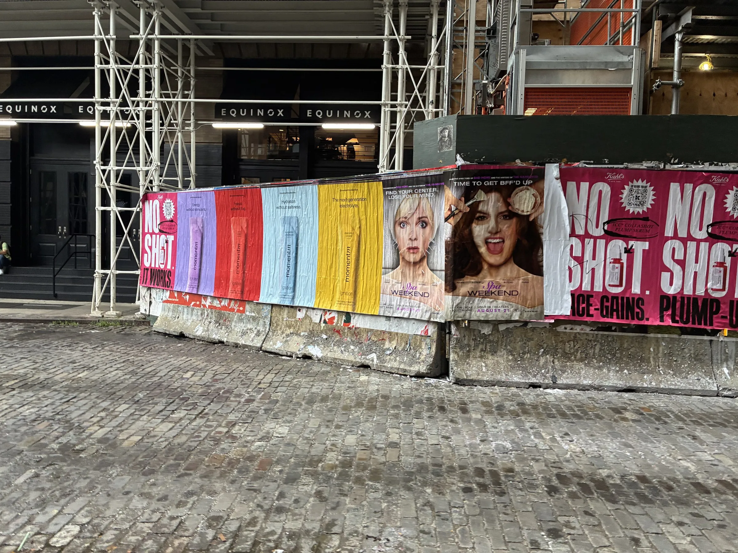 Momentm wheatpaste, stencil and takeaway poster campaign across SoHo, the Lower East Side and Williamsburg by Beyond Street Media