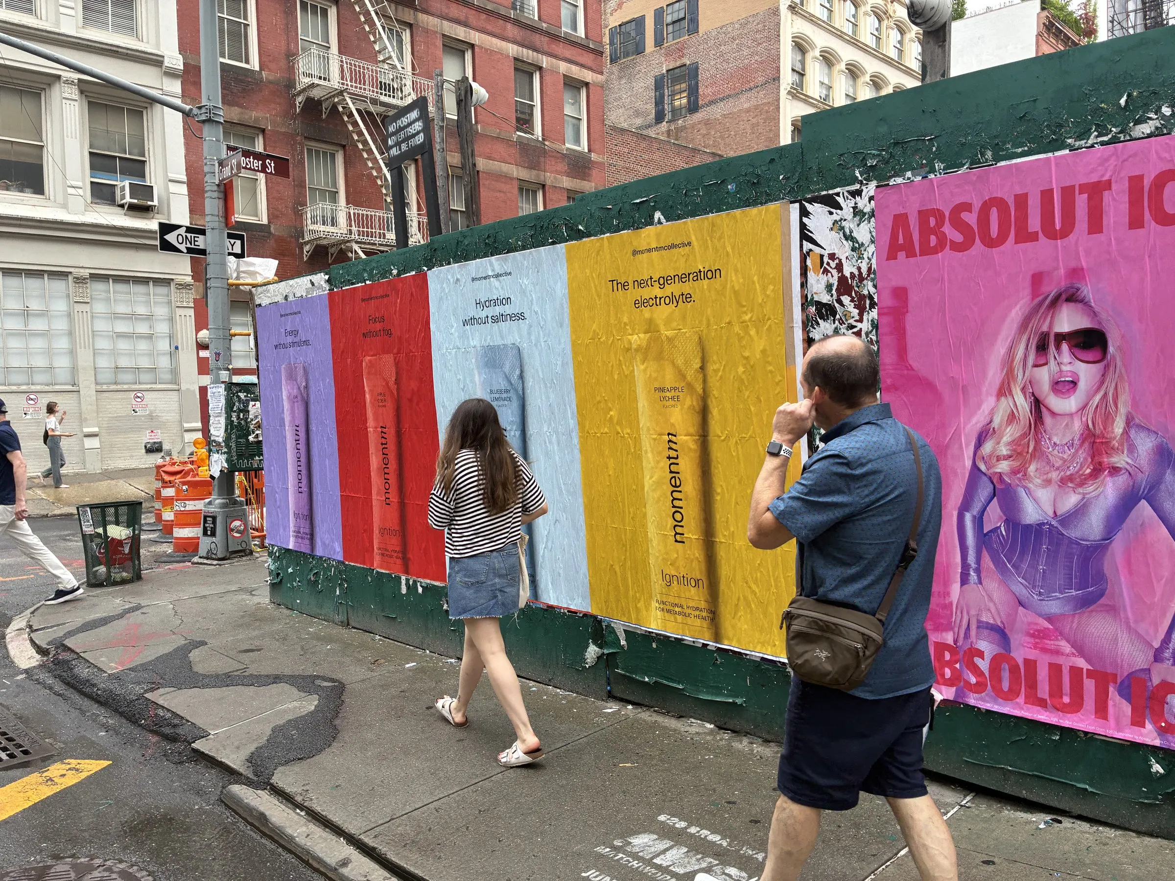 Momentm wheatpaste, stencil and takeaway poster campaign across SoHo, the Lower East Side and Williamsburg by Beyond Street Media