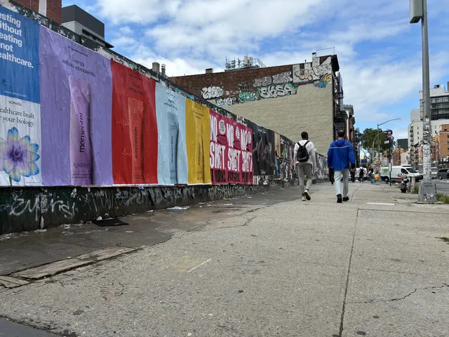 Momentm wheatpaste, stencil and takeaway poster campaign across SoHo, the Lower East Side and Williamsburg by Beyond Street Media