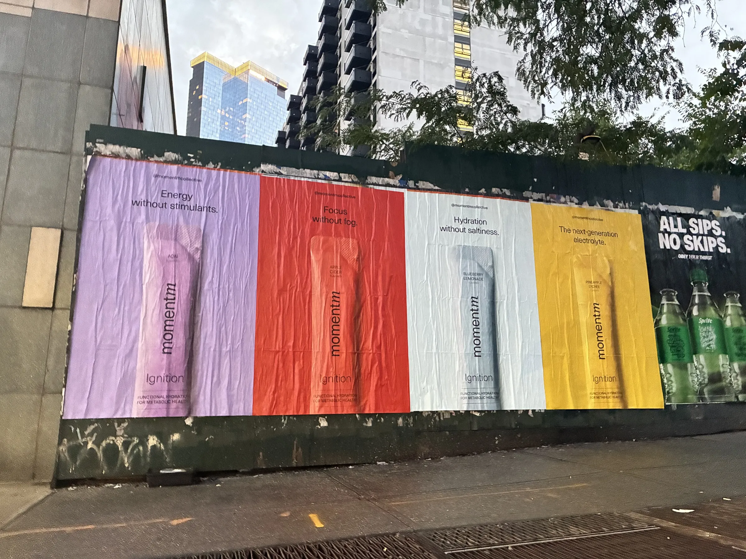 Momentm wheatpaste, stencil and takeaway poster campaign across SoHo, the Lower East Side and Williamsburg by Beyond Street Media